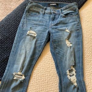 Distressed blue jeans